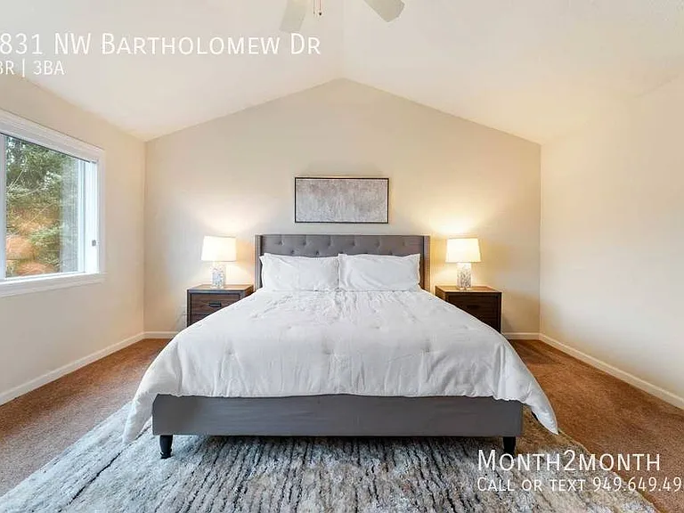 9831 NW Bartholomew Dr — Photo 12
