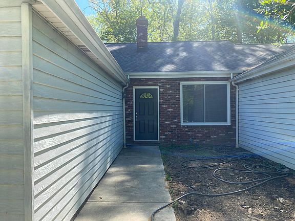 Enterance to the front of house. New roof and gutters.