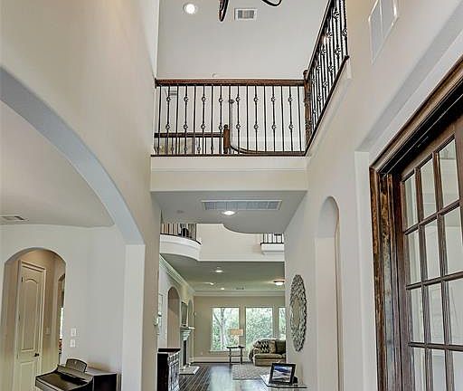 The gracious foyer invites you home and is illuminated by a large chandelier suspended from the second story ceiling. The home has been installed with a Duncan security alarm system (8 zone panel). Security contacts at all operable windows and doors,