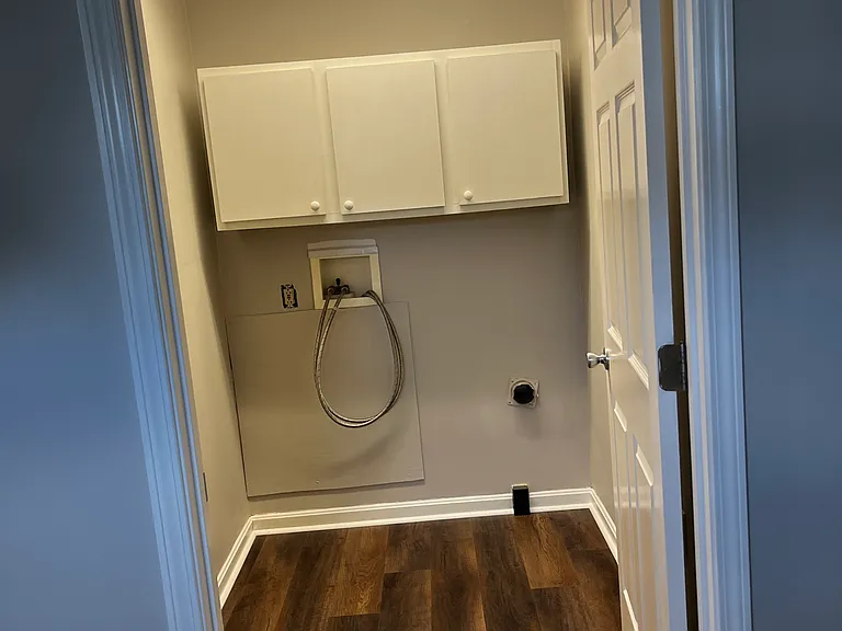 Utility Room with Washer/Dryer Hookups and Storage