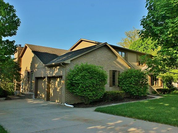 2 Car Attached Garage and Side Entrance.