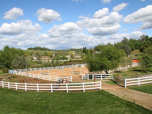 Lighted sand arena with training course