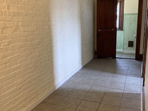 Exposed brick wall when approaching the 2nd floor.
