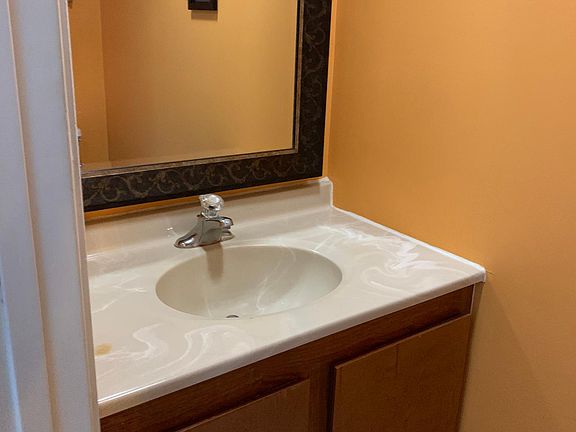 Half bathroom located downstairs