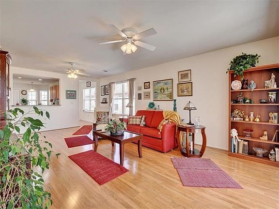 Open floor plan with neutral palette.