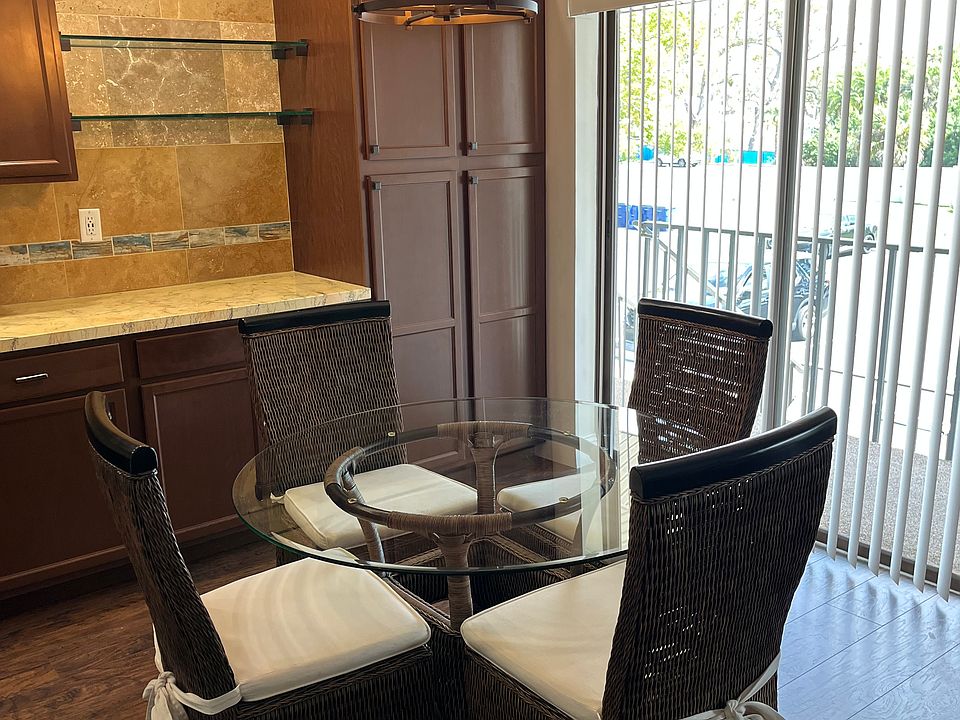 Rattan / Glass top dinette set