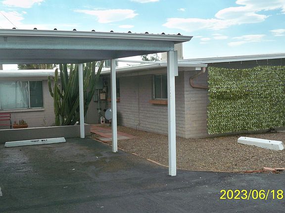 Carport and entry to the rear of the unit.