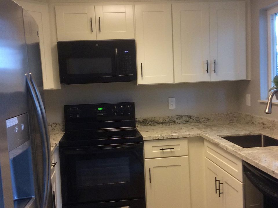 Electric range with microwave