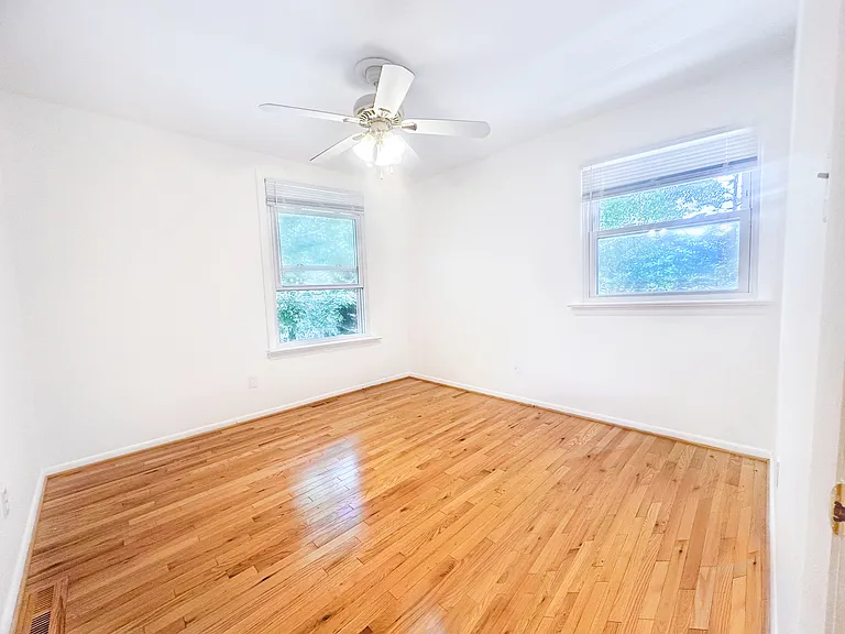 Second bedroom with garden views