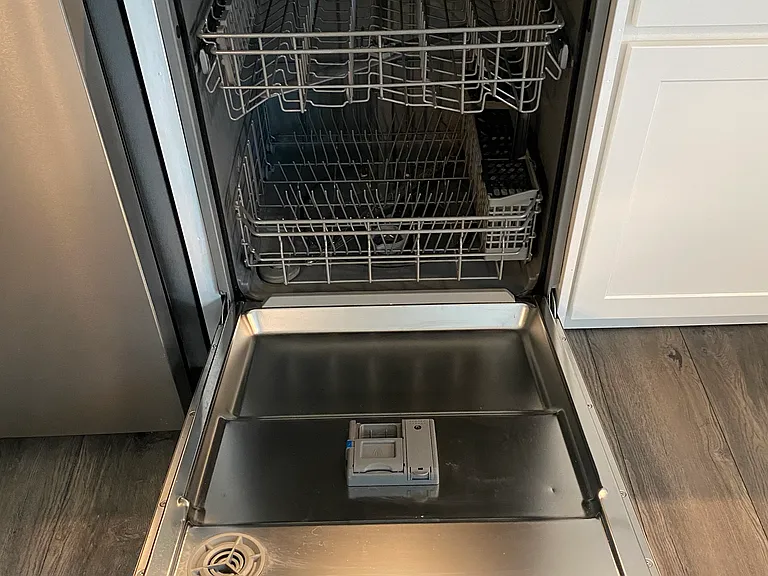 A new energy-efficient dishwasher is included with unit