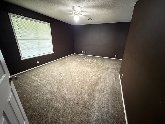 Comfy and oversized bedroom .