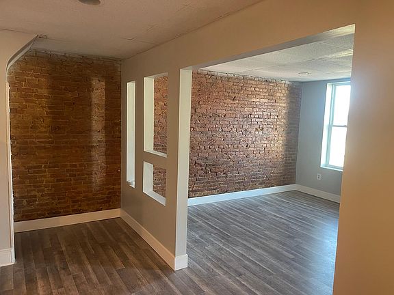 View of Kitchen into Large Living Room