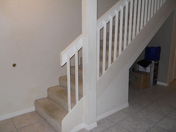 Stairs leading to the bedrooms