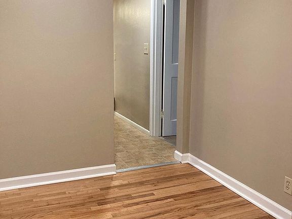 Entry way, leads to laundry room, master suite, kitchen, dining room and lower level family room.
