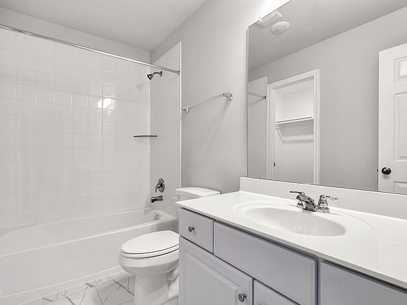 Secondary Bathroom. Note Sample product photo - actual exterior and interior selections may vary by