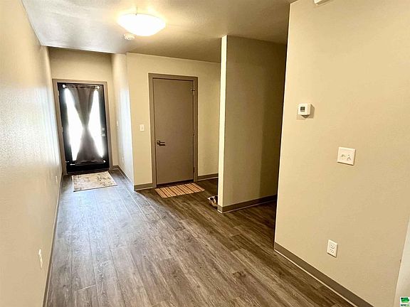 Entry Hallway and door to Garage