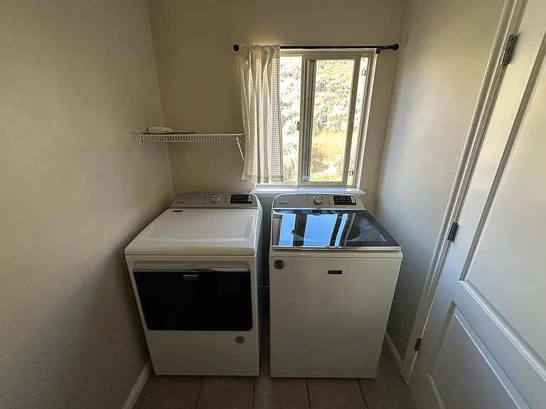 Half bath/laundry room downstairs
