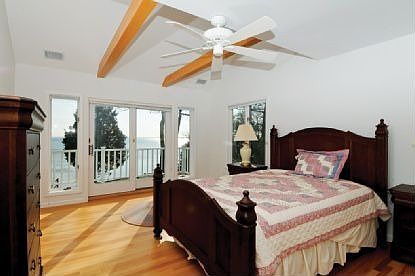 Sunlit bedroom with Seaside Balcony