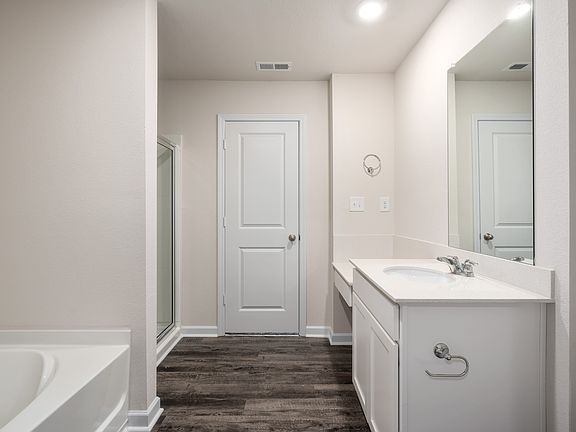 The vanity in the master suite is the perfect place to get ready in the morning
