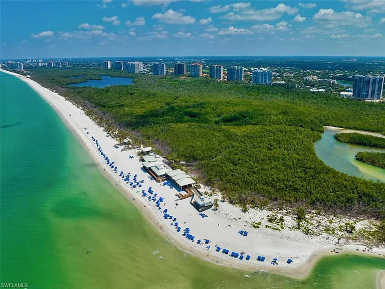 Private Pelican Bay Beach and Restaurants