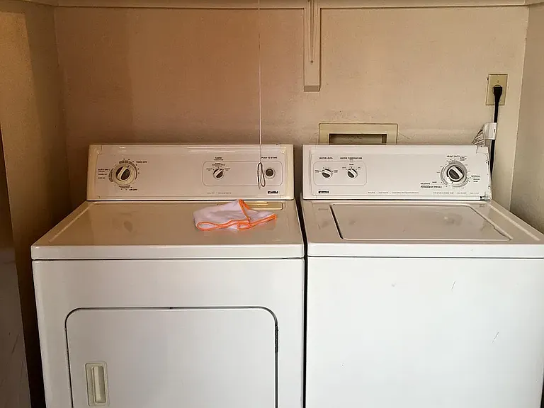 Laundry in outside closet in carport