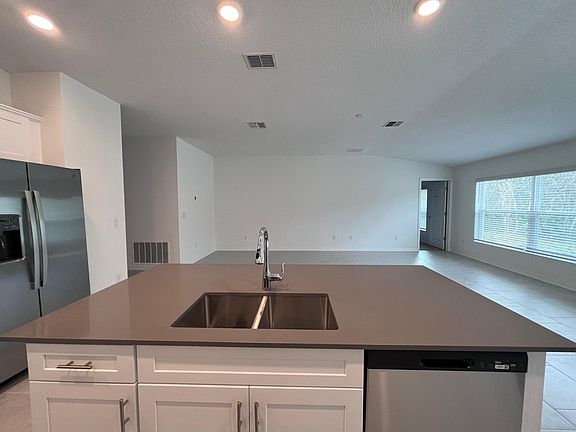 Big Island with sink and dishwasher