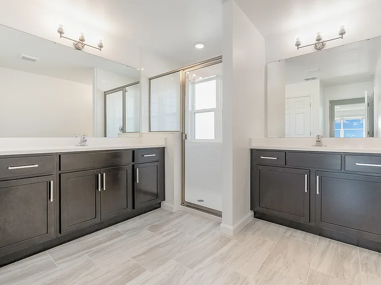 Master bath, duel vanities, and walk in shower