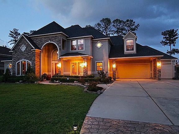 4 car garage {one tandem} with plenty of off-street parking.