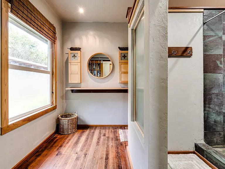 Full bathroom. Gorgeous expansive tile shower.