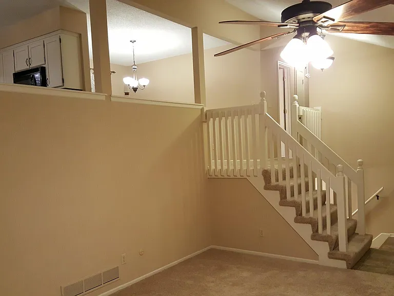 Kitchen, dining room, and living room have a very open feel even though they are on different levels
