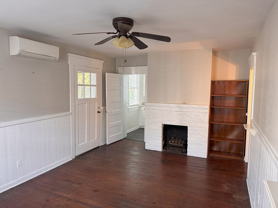 Hardwood floors, Gas Logs, Overhead Fan and HVAC split unit.