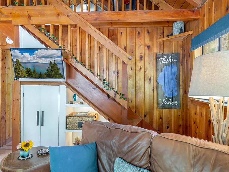 Stairs leading up to loft sleeping area.