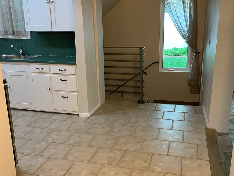 Hallway leading downstairs