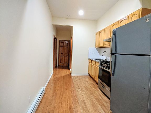 Goes to the bathroom on the right, bedroom straight, and big closet on the left.