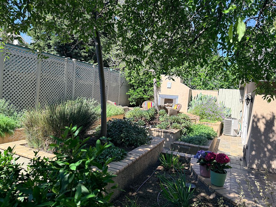 tucked away fireplace area behind home with provided patio furniture - very quiet and great for gatherings