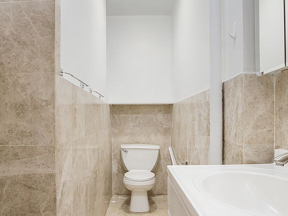 5th image of 209 E 10th St APT 4A