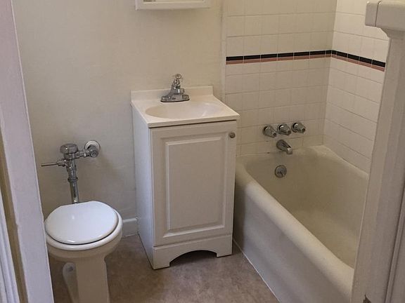 bathroom just to left as you walk in front