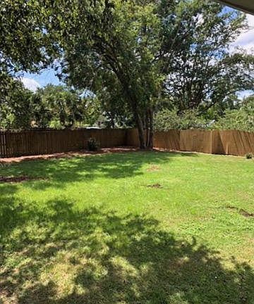 Large fenced back yard, deck and screened porch.