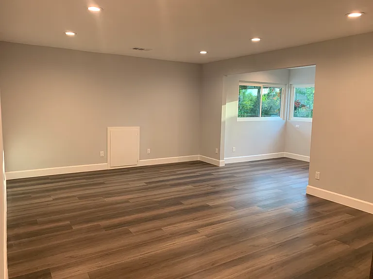 Large primary bedroom on the 2nd floor with reading / office area and garden views