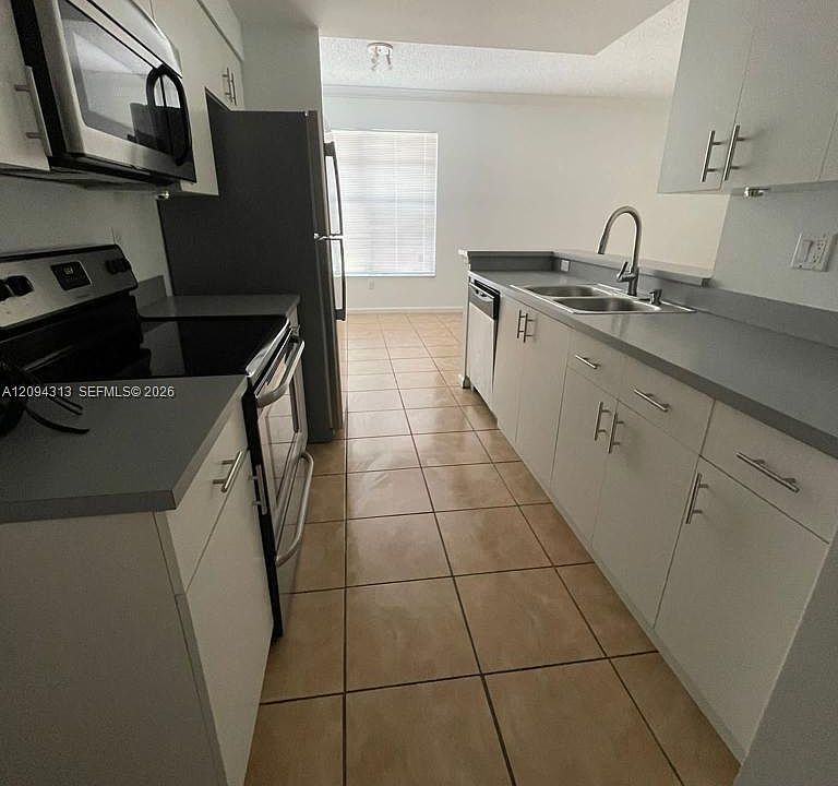1st image of 5840 W Sample Rd APT 105