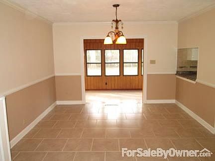 Dining Room
						:
						Chair railing, 2-tone paint. Sun Room in background is 12x16 vaulted t&g ceiling