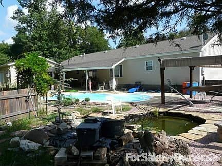 fish pond
						:
						Koi Pond & pergula