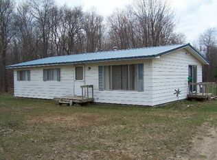 7323 Covert Rd NE, Mancelona, MI 49659