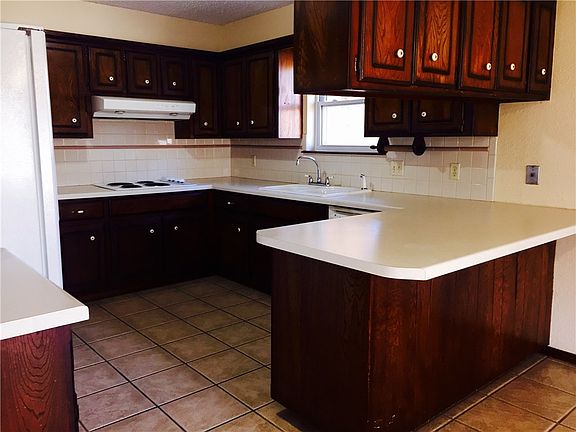 Possibly the tidiest kitchen I have ever seen.  So neat, and perfectly arranged for cooking and spending family time together.  The inside laundry room is just off the kitchen as well.  It leads to a fabulous two car garage.