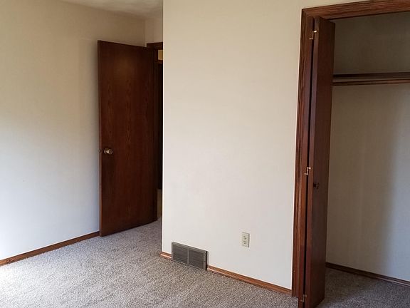 Bedroom with 2 closets and cieling fan