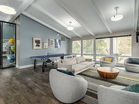 Relax and unwind in this stylish lounge area, perfect for entertainment and leisure.