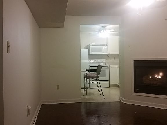 Living Room, Fireplace, Kitchen View