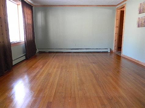 Front entrance leading into living rm..