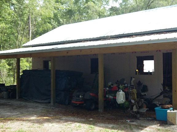 Siding under tarp