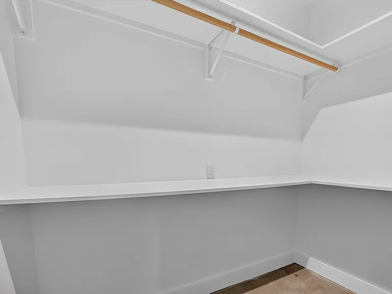 Large walk-in closet in primary bedroom